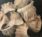 Best Steamed pork Dumplings (8) in Wilmington, NC